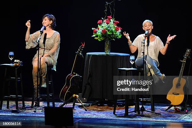 In this handout photo provided by the Las Vegas News Bureau, Pam Tillis and Lorrie Morgan , both daughters of Country Music Hall of Fame inductees,...