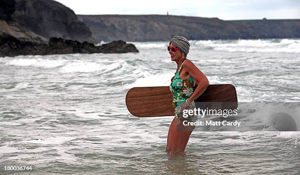 Belly boarder takes part in the senior ladies heats of the annual World Belly Boarding Championships at Chapel Porth on September 8 2013 in Cornwall,...