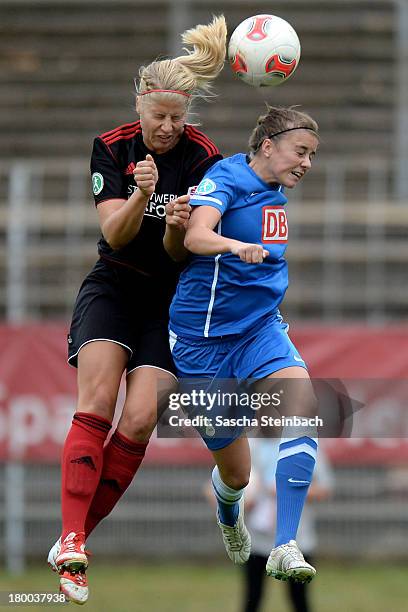 Lena Wermelt of Herford and Madeleine Wojtecki of Luebars battle for a header during the 2. Frauen Bundesliga Nord match between Herforder SV and 1....