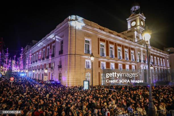 Hundreds of people gather to witness the Christmas lighting ceremony in Puerta del Sol. The city of Madrid organized a Christmas lighting ceremony...