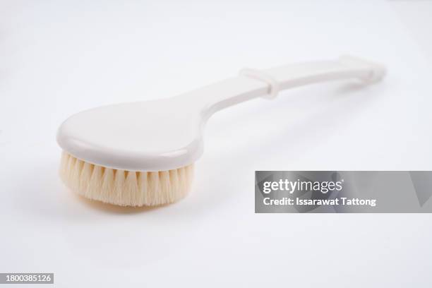body scrub brush with handle,long handle bath brush isolated on white background - loofah stock pictures, royalty-free photos & images