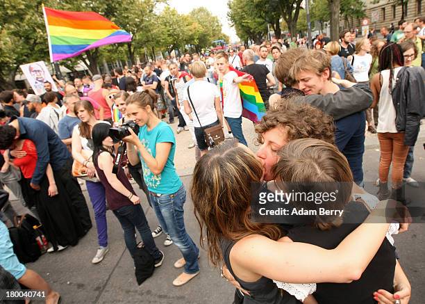 Daniela Janjic, Marianna Salzmann and Nora Haakh kiss in front of the Russian Embassy as part of the 'To Russia With Love' Global Kiss-In on...