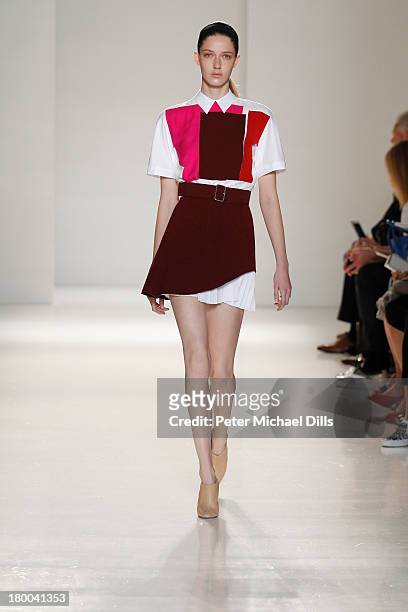 Model walks the runway at the Victoria Beckham Presentation during Mercedes-Benz Fashion Week Spring 2014 at Cafe Rouge on September 8, 2013 in New...