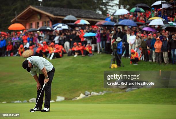 Raig Lee of Scotland reacts to missing a birdie putt on the 18th green to win during the final round of the Omega European Masters at the...