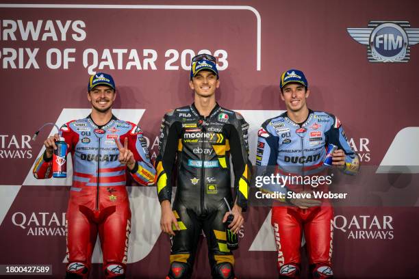 MotoGP Top 3 riders at parc ferme with Luca Marini of Italy and Mooney VR46 Racing Team , Fabio Di Giannantonio of Italy and Gresini Racing MotoGP...