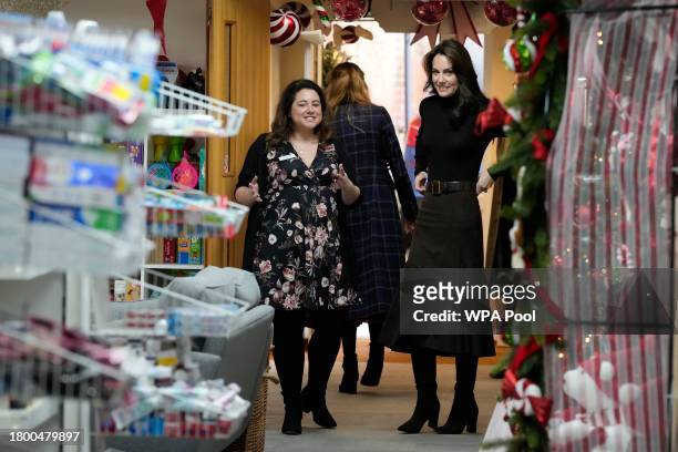 Catherine, Princess of Wales, right with Bianca Sakol Founder of Sebby's Corner look at equipment and toys during her visit to Sebby's Corner on...