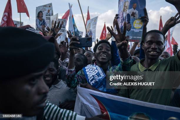 Supporters of Moise Katumbi, one of the main opponents of President Felix Tshisekedi, attend his election rally in a stadium in Goma, one of the...