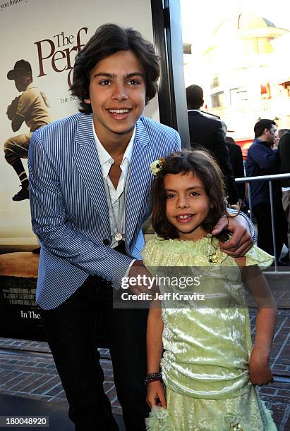 Actor Jake T. Austin and guest arrive to the Los Angeles premiere of The Perfect Game in the Pacific Theaters at the Grove on April 5, 2010 in Los...