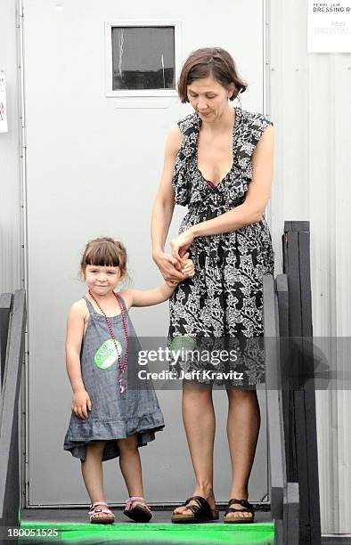 Maggie Gyllenhal and daughter during the 41st Annual New Orleans Jazz & Heritage Festival Presented by Shell at the Fair Grounds Race Course on May...