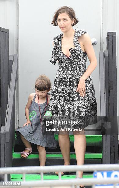 Maggie Gyllenhal and daughter during the 41st Annual New Orleans Jazz & Heritage Festival Presented by Shell at the Fair Grounds Race Course on May...