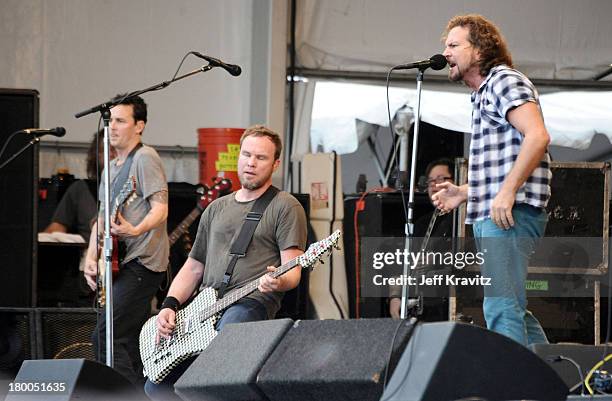 Mike McCready, Jeff Ament and Eddie Vedder of Pearl Jam performs during the 41st Annual New Orleans Jazz & Heritage Festival Presented by Shell at...