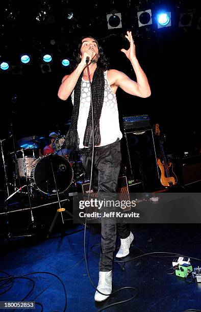 Comedian Russell Brand of Infant Sorrow and Friends performs onstage during Get Him To The Greek at The Roxy Theatre on May 24, 2010 in West...