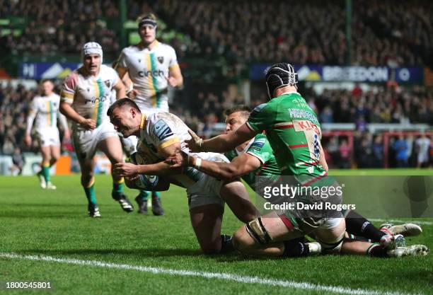 George Furbank of Northampton Saints dives over to score their first try during the Gallagher Premiership Rugby match between Leicester Tigers and...
