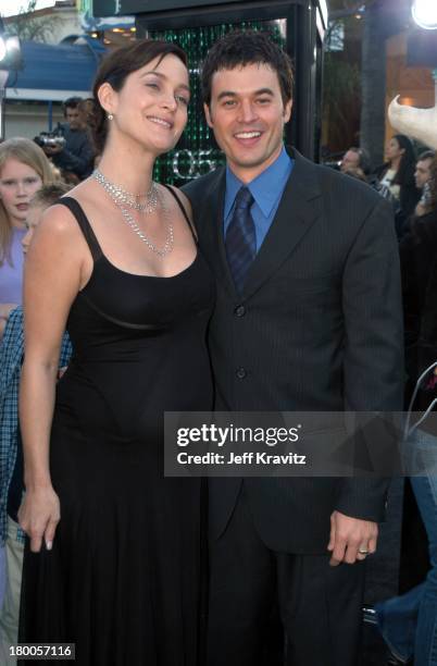 Carrie-Anne Moss and Steven Roy during The Matrix Reloaded Premiere at Mann Village Theater in Westwood, California, United States.