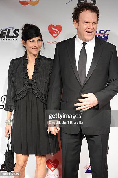 Actor John C. Reilly and wife Alison Dickey arrive at 2010 MusiCares Person Of The Year Tribute To Neil Young at the Los Angeles Convention Center on...