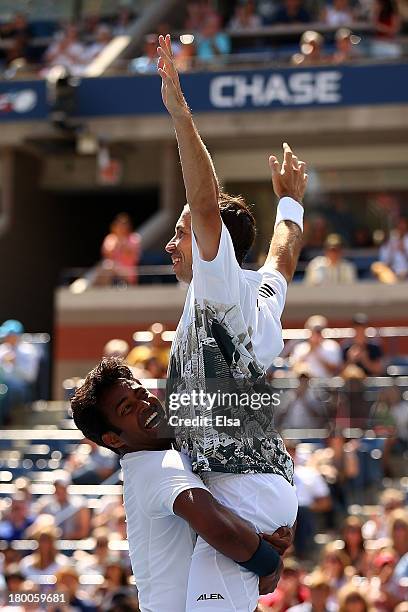 Leander Paes of India and Radek Stepanek of the Czech Republic celebrate winning their men's doubles final against Alexander Peya of Austria and...