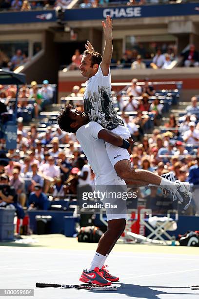 Leander Paes of India and Radek Stepanek of the Czech Republic celebrate winning their men's doubles final against Alexander Peya of Austria and...