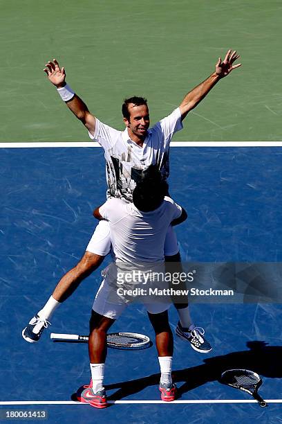 Leander Paes of India and Radek Stepanek of the Czech Republic celebrate winning their men's doubles final against Alexander Peya of Austria and...