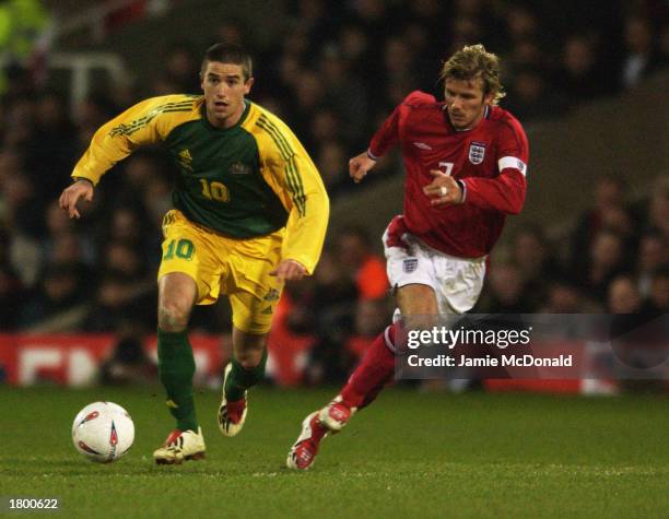 Harry Kewell of Australia goes past David Beckham of England during the International Friendly match between England and Australia held on February...