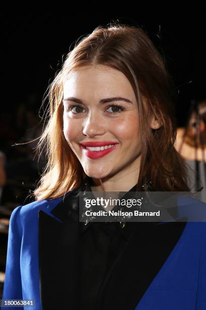Actress Holland Roden attends DKNY Women's fashion show during Mercedes-Benz Fashion Week Spring 2014 on September 8, 2013 in New York City.