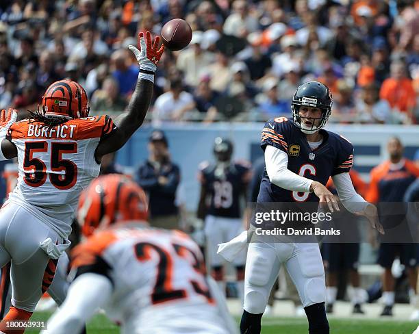 Jay Cutler of the Chicago Bears pass is blocked by Vontaze Burfict of the Cincinnati Bengals during the first half on September 8, 2013 at Soldier...