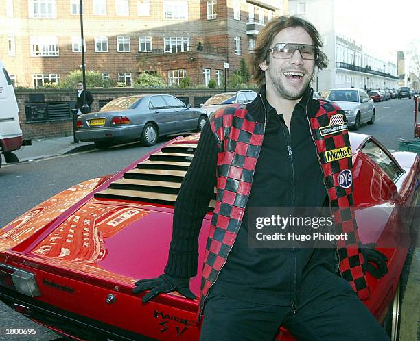 Jamiroquai lead singer Jay Kay's Lamborghini Miura breaks down at a fahsion show venue February 17, 2003 in London.