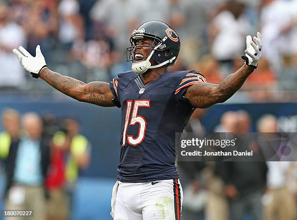 Brandon Marshall of the Chicago Bears celebrates a win over the Cincinnati Bengals in the final seconds at Soldier Field on September 8, 2013 in...