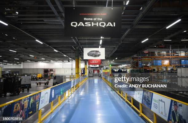 General view of a section of the production line at the Nissan factory in Sunderland, north east England on November 24 where the Japanese vehicle...