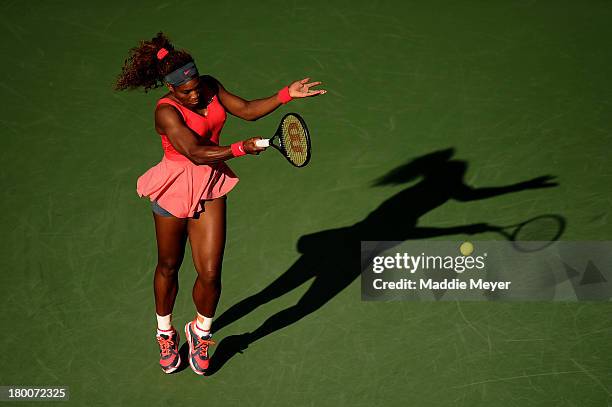 Serena Williams of the United States of America plays a forehand during her women's singles final match against Victoria Azarenka of Belarus on Day...