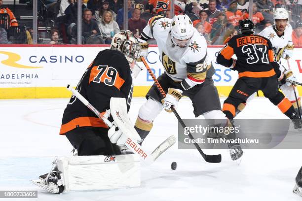 William Carrier of the Vegas Golden Knights attempts a shot past Carter Hart of the Philadelphia Flyers during the first period at the Wells Fargo...