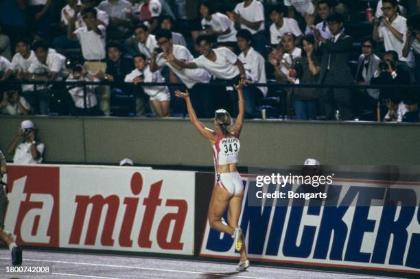 German athlete Katrin Krabbe waving from the track at the 1991 IAAF World Championships, held at the National Stadium in Kasumigaoka, Shinjuku,...