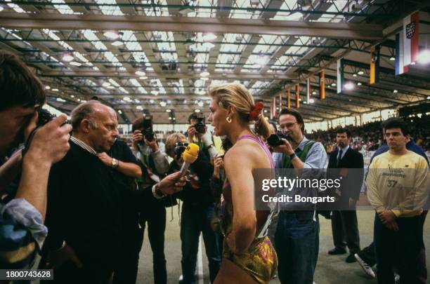 German athlete Katrin Krabbe is interviewed at the 1992 German Indoor Athletics Championships, held at the Europahalle in Karlsruhe,...