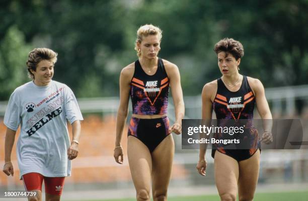 German athlete Silke Moller, German athlete Katrin Krabbe, and German athlete Grit Breuer at their training base in Neubrandenburg,...