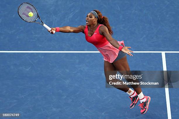 Serena Williams of the United States of America plays a forehand during her women's singles final match against Victoria Azarenka of Belarus on Day...