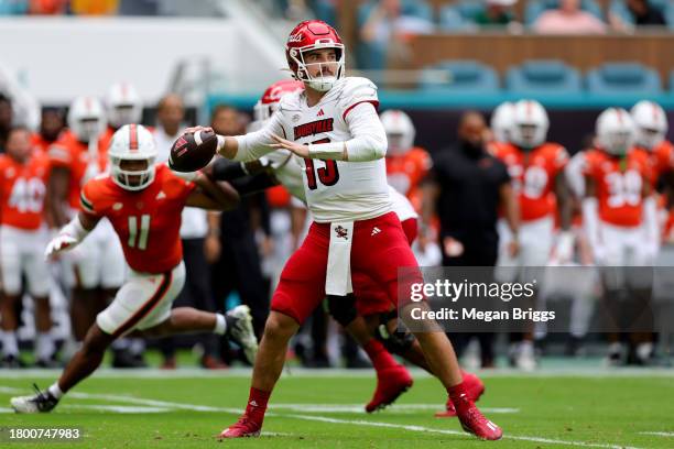 Jack Plummer of the Louisville Cardinals throws a pass against the Miami Hurricanes during the second quarter of the game at Hard Rock Stadium on...