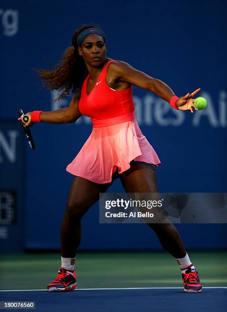 Serena Williams of the United States of America plays a forehand during her women's singles final match against Victoria Azarenka of Belarus on Day...