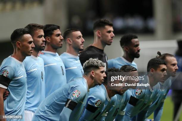 The players of Israel pose for a team photo prior to kick-off ahead of the UEFA EURO 2024 European qualifier match between Israel and Romania at...