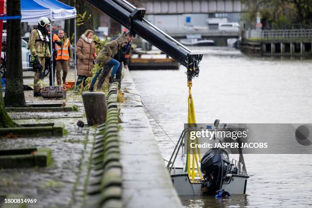 Illustration picture shows a searching action in the Dender river, in Aalst, Friday 24 November 2023. The searching is allegedly connected to the...