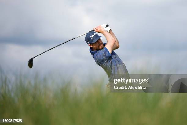 Sam Ryder of the United States hits a tee shot on the 15th hole during the third round of The RSM Classic on the Seaside Course at Sea Island Resort...