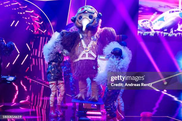 Der Kiwi" performs on stage during the first showing of season 9 of "The Masked Singer" on November 18, 2023 in Cologne, Germany.