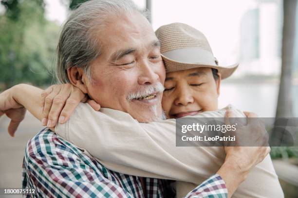 senior couple enjoying a vacation together - bangkok people stock pictures, royalty-free photos & images