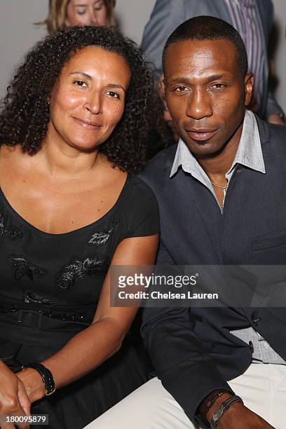 Patricia Blanchet and Leon Robinson attend the Ricardo Seco fashion show during Mercedes-Benz Fashion Week Spring 2014 at Eyebeam Studio on September...