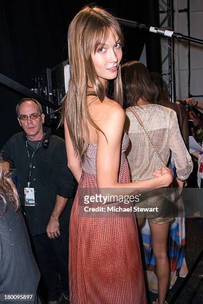 Model Karlie Kloss prepares backstage the Diane Von Furstenberg show during Spring 2014 Mercedes-Benz Fashion Week at The Theatre at Lincoln Center...