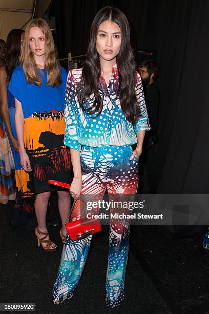 Model prepare backstage before the Diane Von Furstenberg show during Spring 2014 Mercedes-Benz Fashion Week at The Theatre at Lincoln Center on...