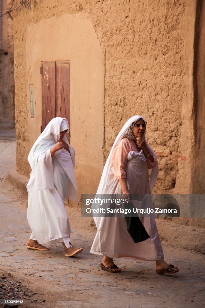 Arab women walking in oasis town of Figuig