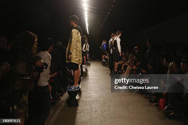 Models walk the runway at the Ricardo Seco fashion show during Mercedes-Benz Fashion Week Spring 2014 at Eyebeam Studio on September 8, 2013 in New...