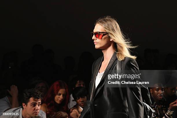 Model walks the runway at the Ricardo Seco fashion show during Mercedes-Benz Fashion Week Spring 2014 at Eyebeam Studio on September 8, 2013 in New...