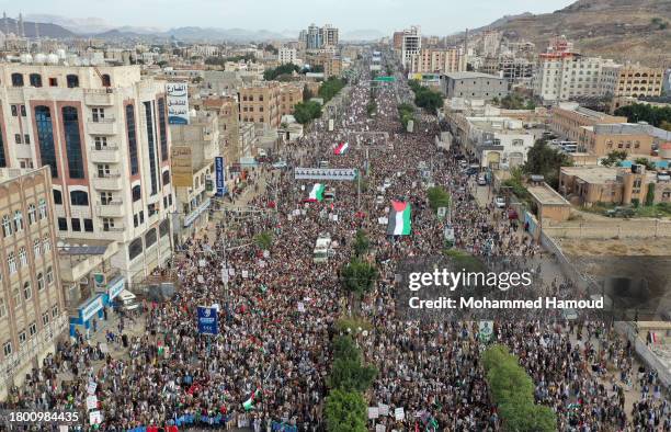 Yemenis participate in a pro-Palestinian protest against the escalating Israeli military actions in Gaza on November 18, 2023 in Sana'a, Yemen. Since...