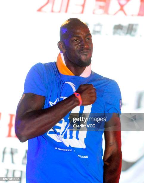 American NBA player Kevin Garnett of the Brooklyn Nets meets fans at South China Normal University on September 8, 2013 in Guangzhou, China.