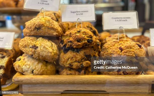 platter of scones at cafe counter - cereal bar fotografías e imágenes de stock
